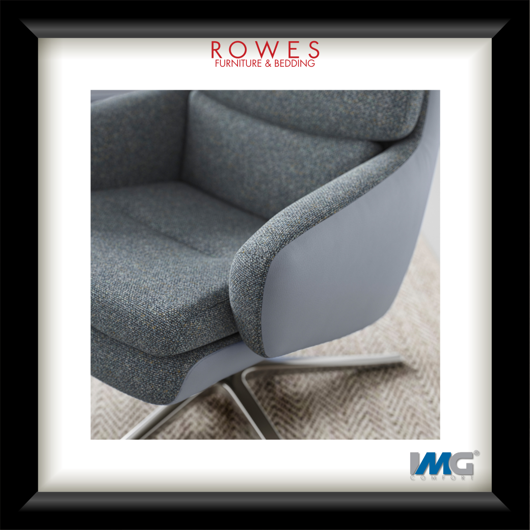 Gray upholstered chair with 'Rowes Furniture & Bedding' logo above and 'MG' logo below.