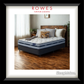 Mattress on a wooden bed frame with 'Rowes Furniture & Bedding' branding.