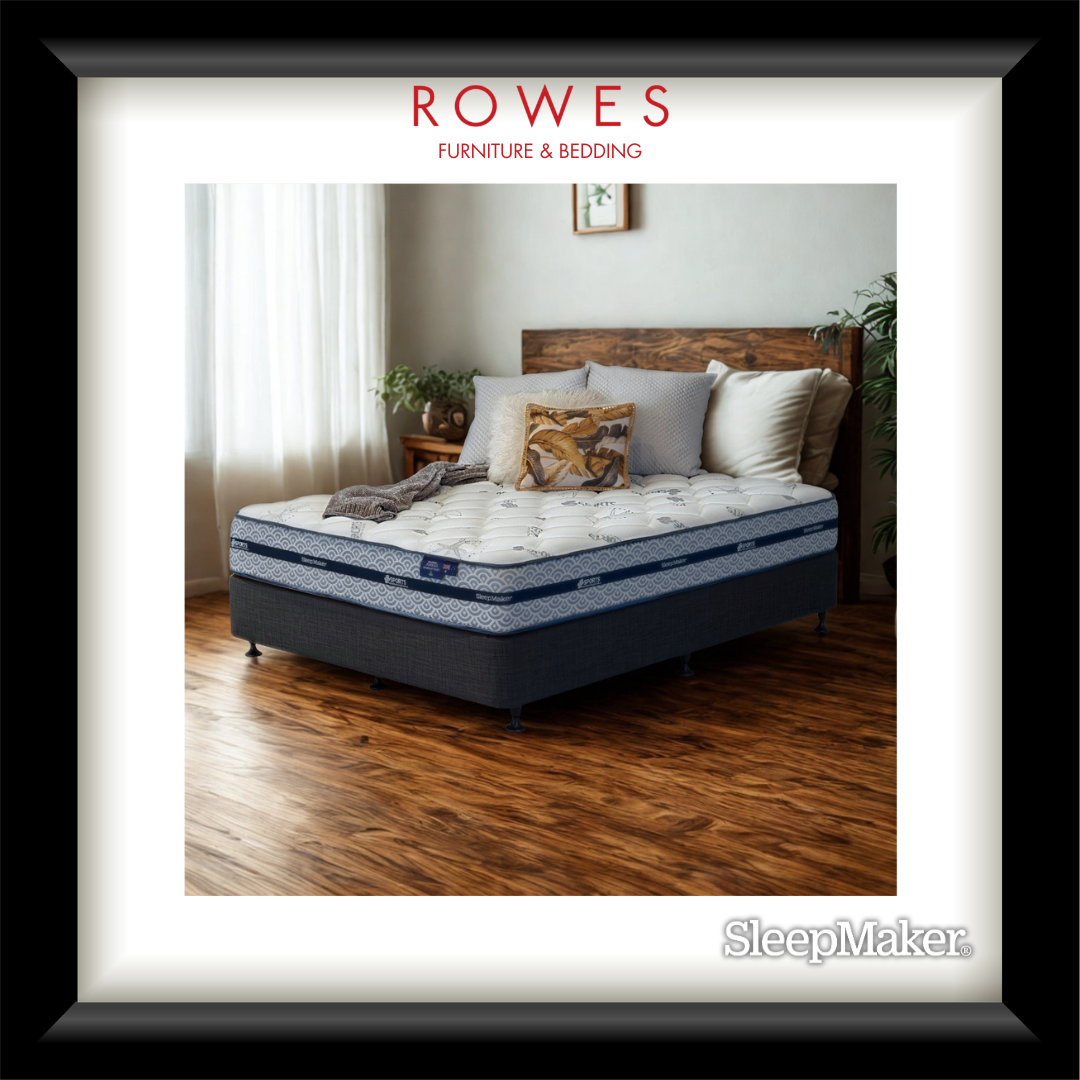 Mattress on a wooden bed frame with 'Rowes Furniture & Bedding' branding.