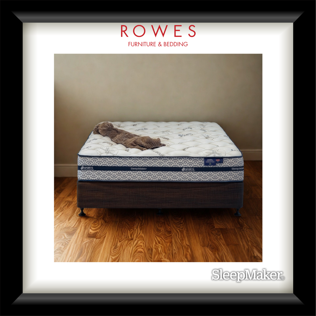 Mattress on a wooden floor with 'Rowes Furniture & Bedding' branding.