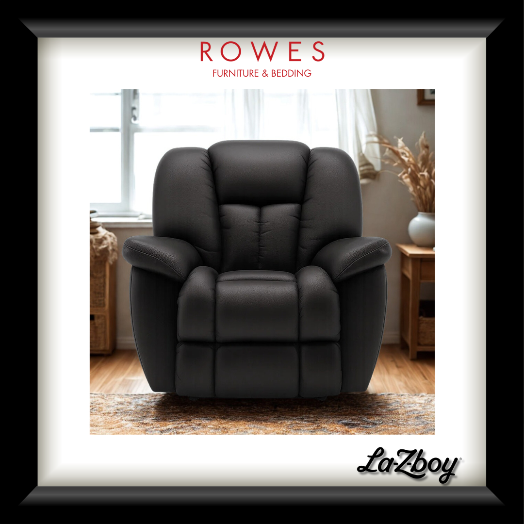 Black recliner chair in a room with 'Rowes Furniture & Bedding' and 'La-Z-Boy' branding.