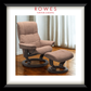 Brown recliner chair with ottoman on a wooden floor, branded 'Rowes'.