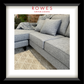 Gray sectional sofa with cushions on a patterned rug, branded as Rowes Furniture & Bedding.