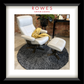 White chair and ottoman with a yellow blanket on a gray rug, branded as Rowes Furniture & Bedding.