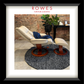 White recliner chair with wooden base on a gray rug, with 'Rowes Furniture & Bedding' logo above.