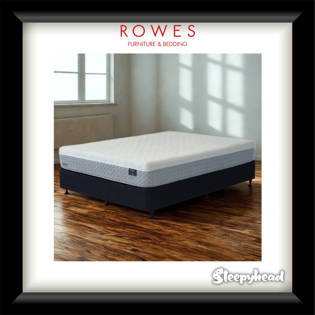Mattress on a wooden floor with 'Rowes Furniture & Bedding' and 'Sleepyhead' branding.