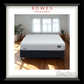 White mattress on a wooden floor with 'Rowes Furniture & Bedding' and 'Sleepyhead' branding.