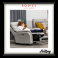 Person using a smartphone in a recliner chair with 'Rowes Furniture & Bedding' and 'LaZboy' branding.