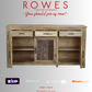 Wooden sideboard with 'Rowes Furniture and Bedding' text and logos on a gray background