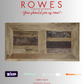 Wooden frame with 'Rowes Furniture and Bedding' advertisement on a gray background