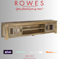 Wooden TV stand with 'Rowes Furniture and Bedding' advertisement on a gray background