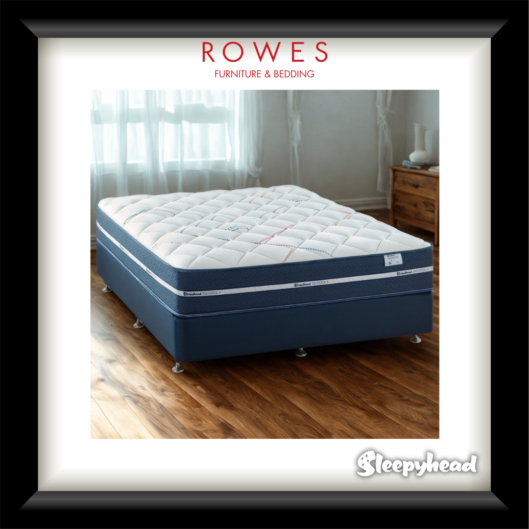 Blue mattress with white quilted top on a wooden floor, branded as 'Sleepyhead' with 'Rowes Furniture & Bedding' above.