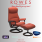Red recliner chair with ottoman on a gray background, featuring the Stressless brand.