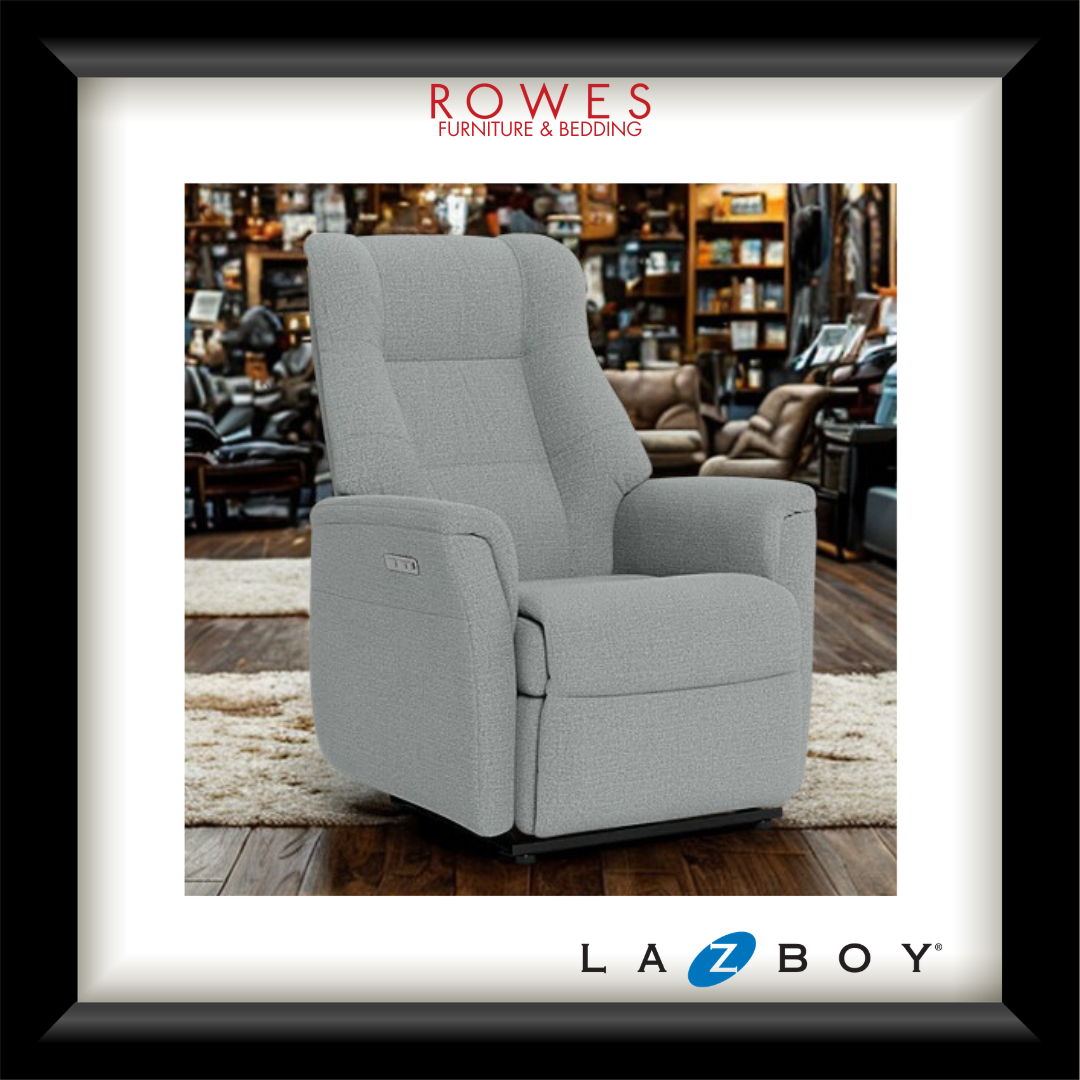 Gray recliner chair in a furniture store with Rowes Furniture & Bedding and La-Z-Boy logos.