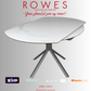 Modern white table with gray legs on a gray background, featuring promotional text and logos.