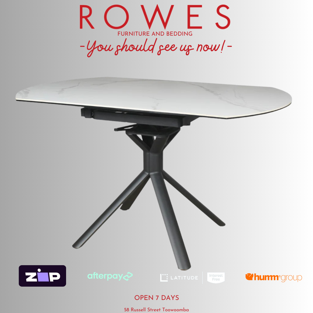 Modern dining table with 'Rowes Furniture and Bedding' branding and payment options on a gray background.