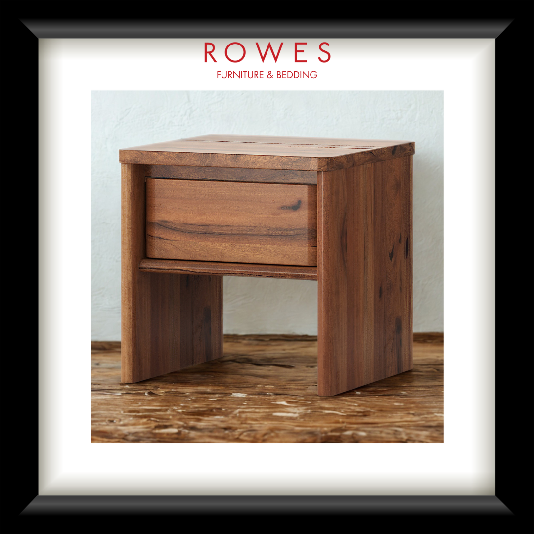 Wooden nightstand with a drawer on a wooden floor, branded 'Rowes Furniture & Bedding'.