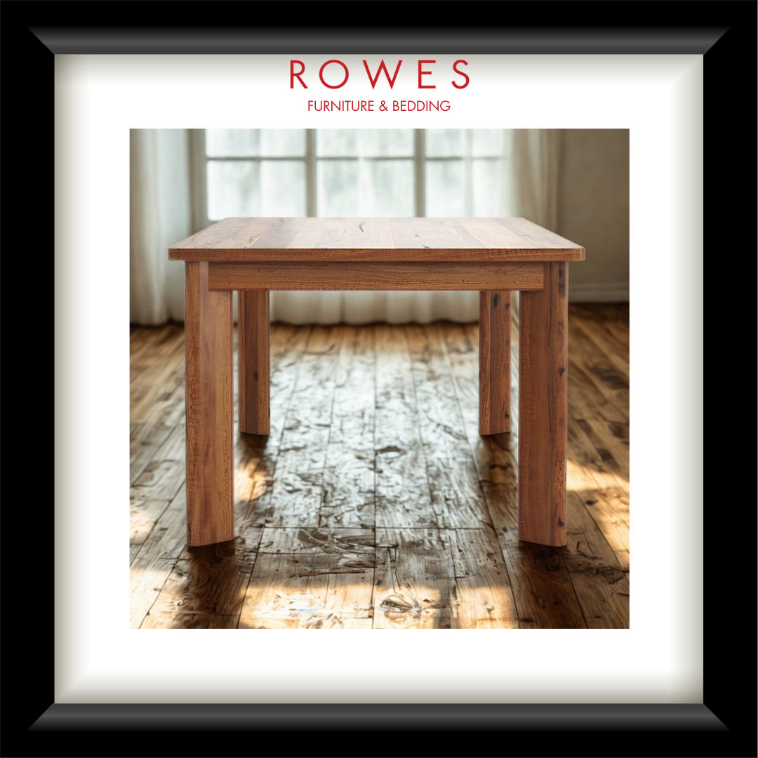 Wooden table on a wooden floor with 'Rowes Furniture & Bedding' branding.