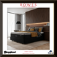 Modern bedroom setup with a bed and headboard, featuring ROWES Furniture and Bedding branding.