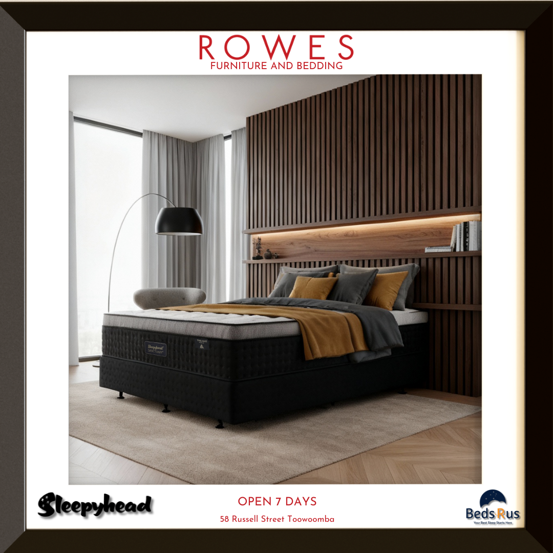 Modern bedroom setup with a bed and headboard, featuring ROWES Furniture and Bedding branding.