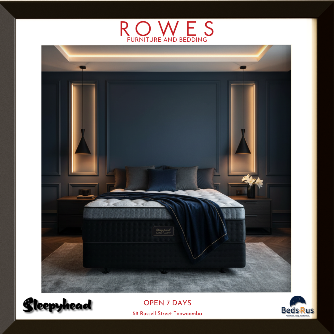 Bedroom with a bed and nightstands, featuring 'Rowes Furniture and Bedding' branding.
