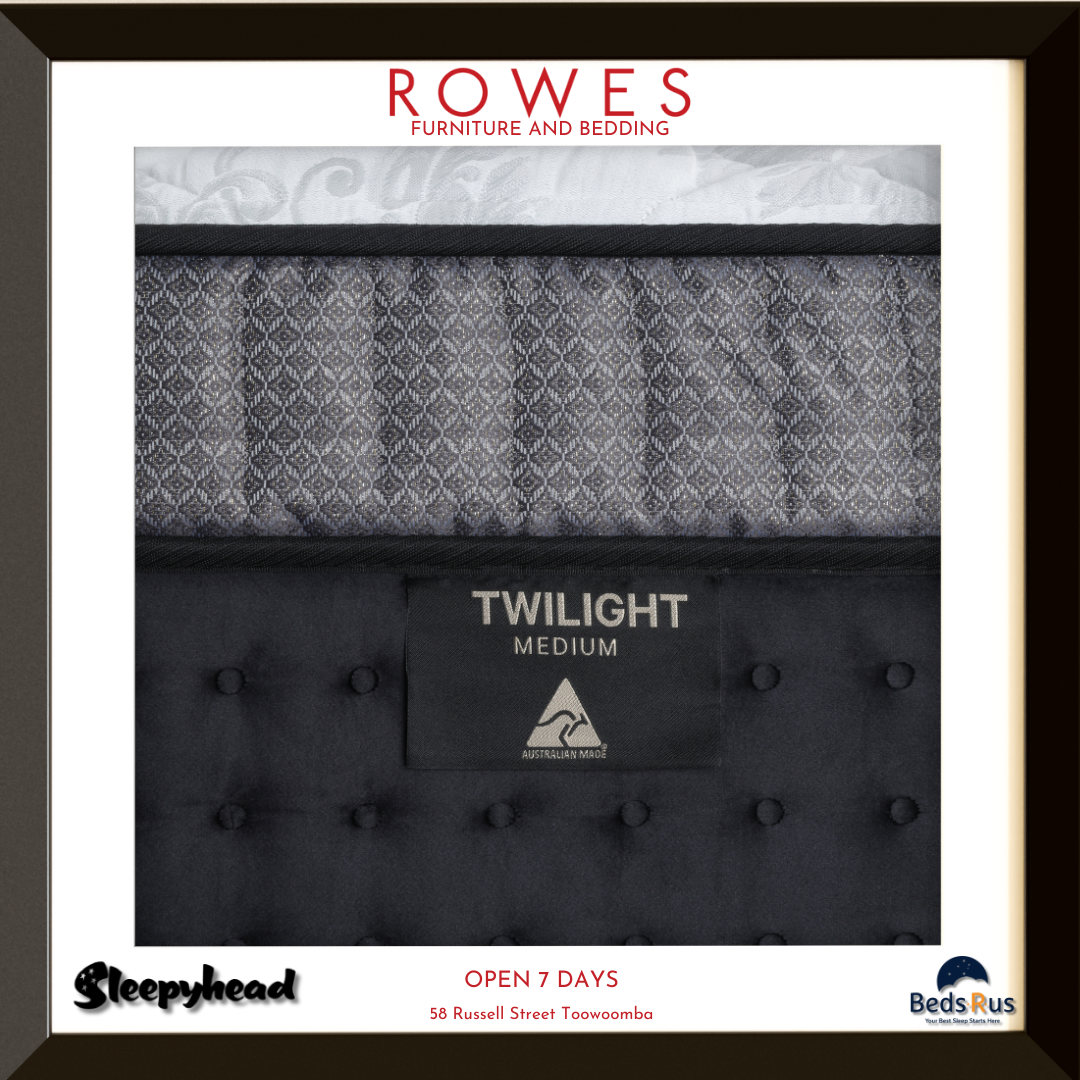 Black upholstered bed with 'Twilight' mattress label, featuring Rowes Furniture and Bedding branding.