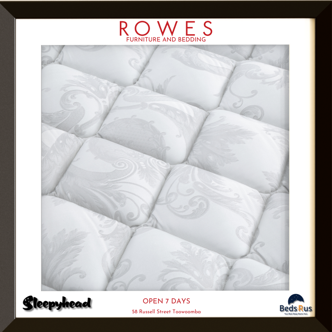 White quilted mattress with 'Rowes Furniture and Bedding' branding.