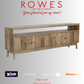 Wooden TV stand with 'Rowes Furniture and Bedding' advertisement on a white background
