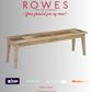 Wooden bench with 'Rowes Furniture and Bedding' advertisement on a gray background