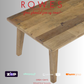 Wooden table with promotional text and logos on a gray background