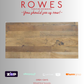 Wooden table top with 'Rowes Furniture and Bedding' text and payment logos on a gray background