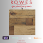 Wooden top with 'Rowes Furniture and Bedding' advertisement on a gray background
