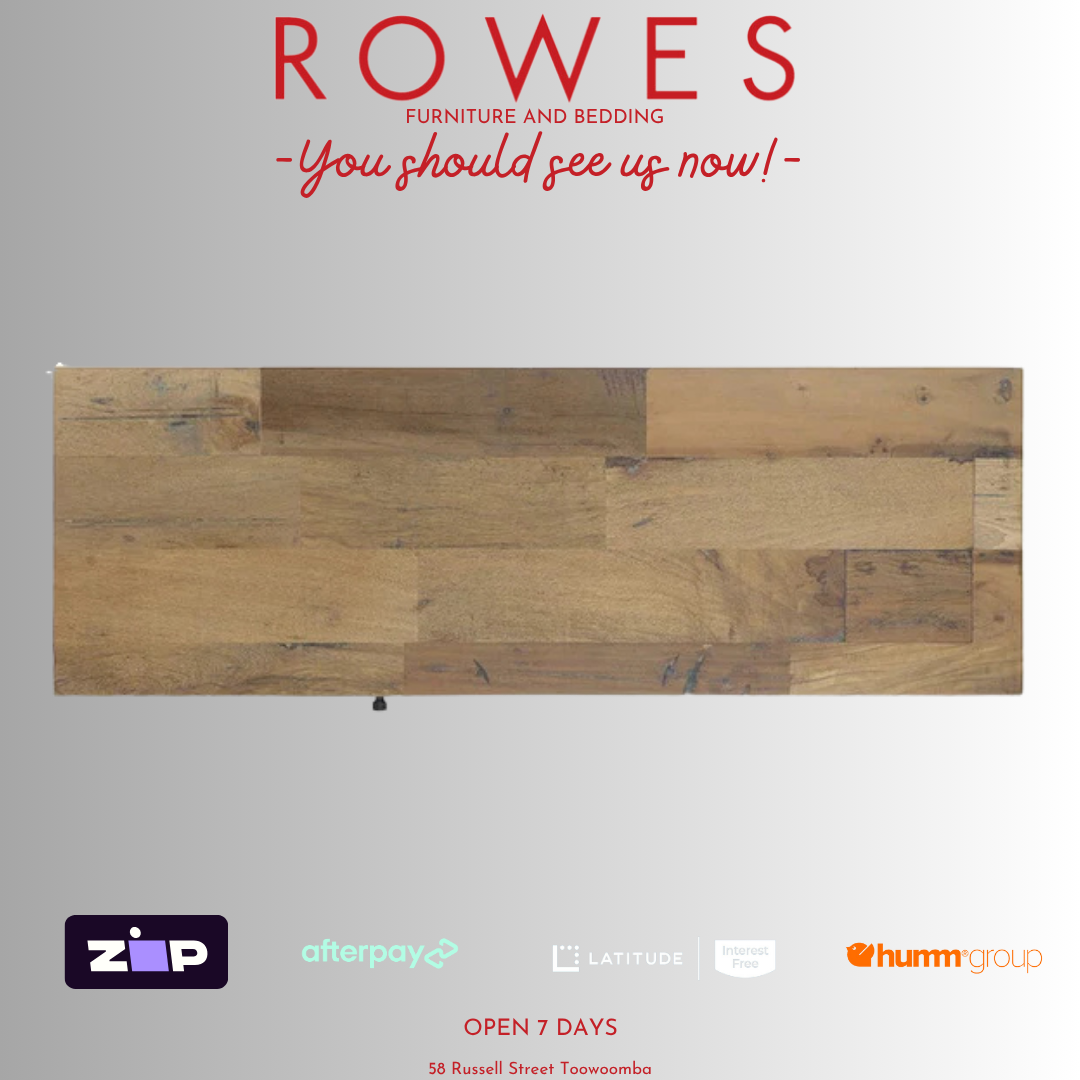 Wooden panel with 'Rowes Furniture and Bedding' advertisement on a gray background