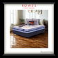 SleepMaker mattress in a room with Rowes Furniture & Bedding branding.