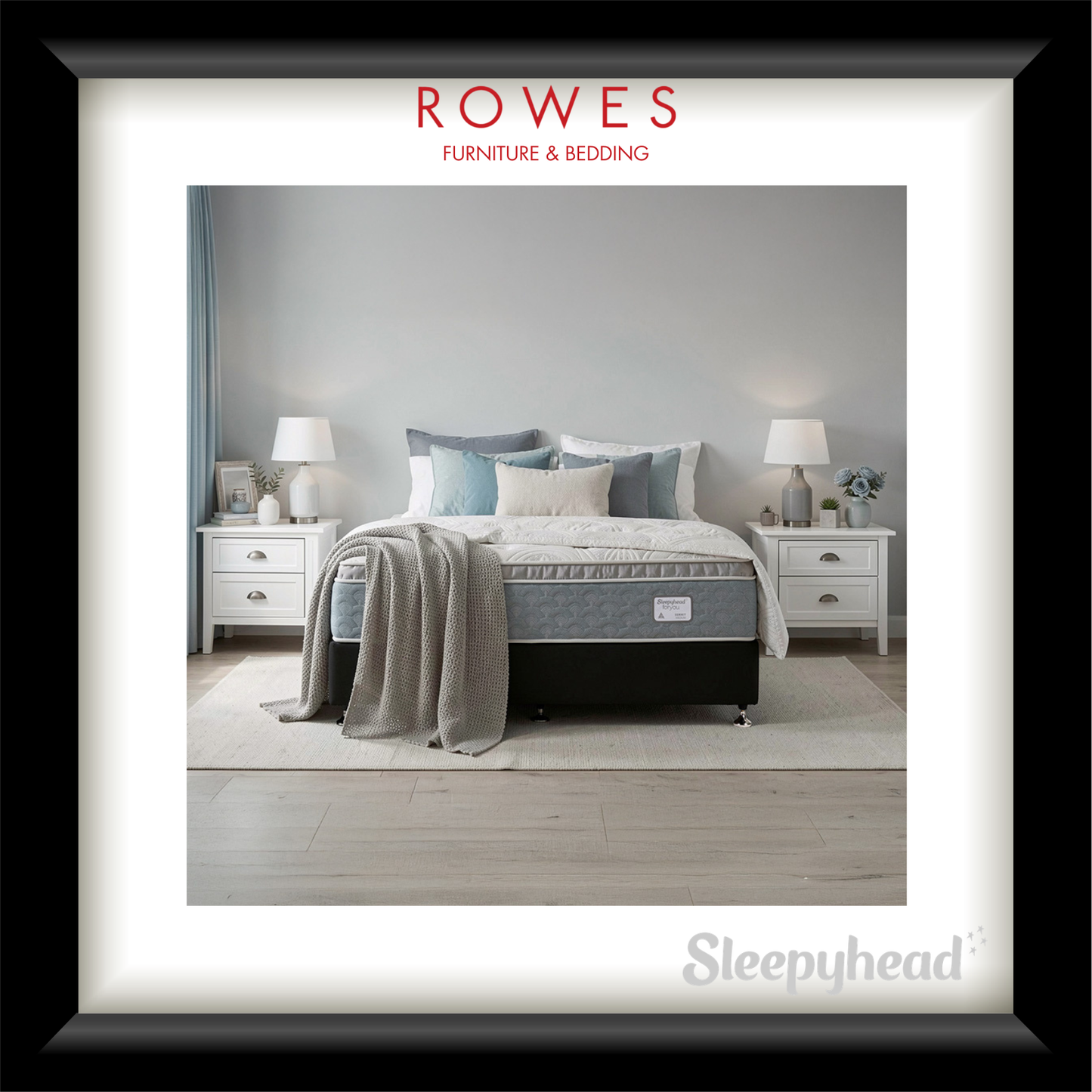 Bedroom setup with a mattress and bedding, featuring Rowes Furniture & Bedding branding.