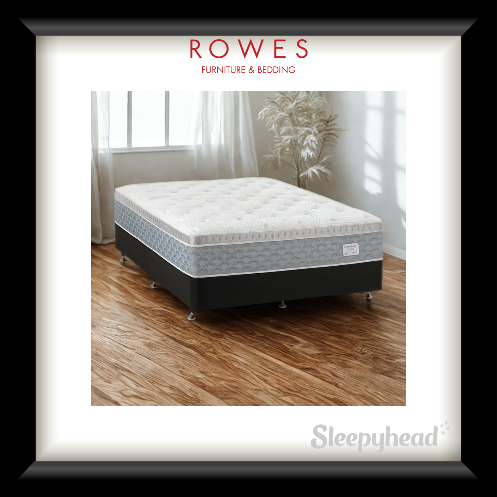 Mattress on a wooden floor with 'Rowes Furniture & Bedding' branding.
