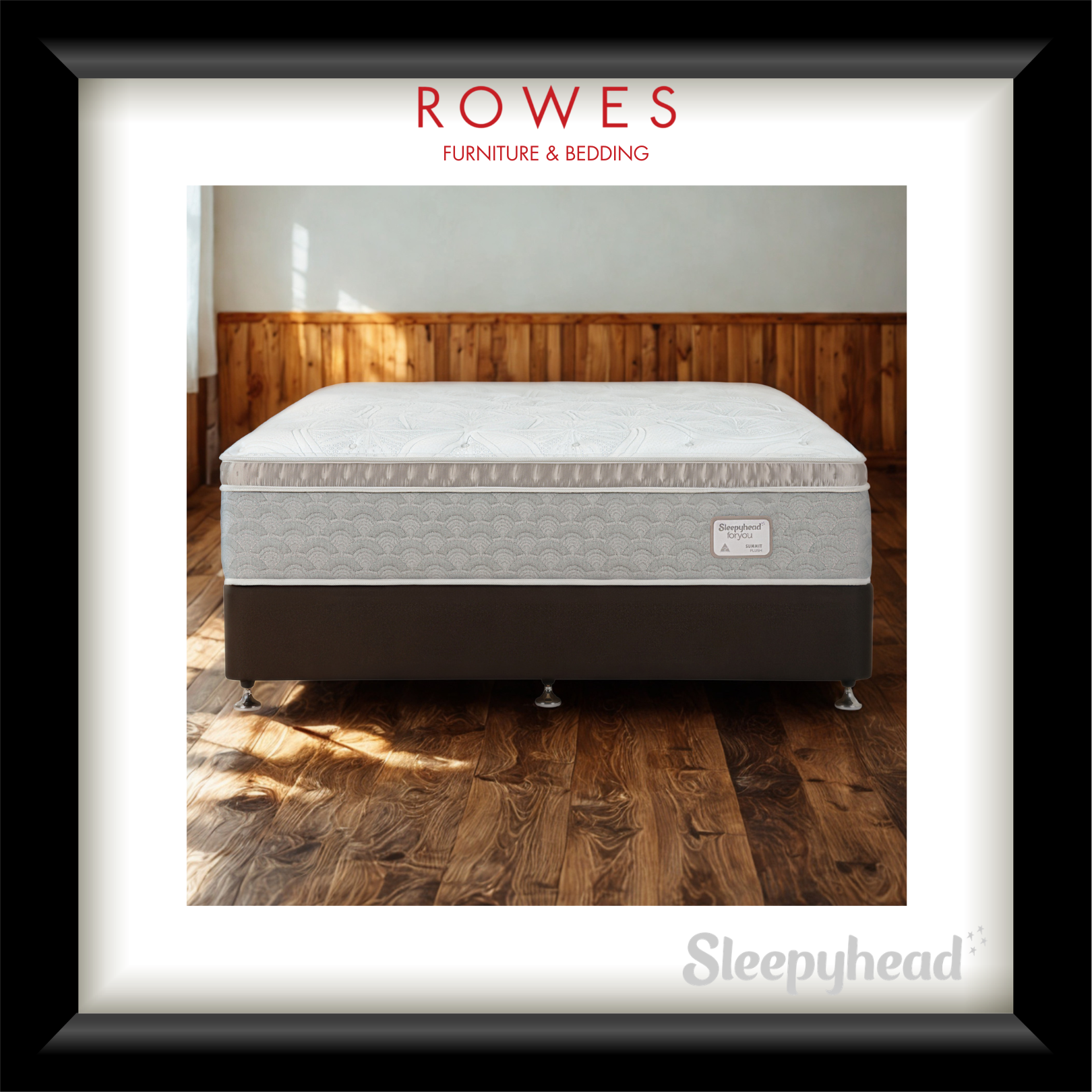 Mattress on a wooden floor with 'Rowes Furniture & Bedding' and 'Sleepyhead' branding.