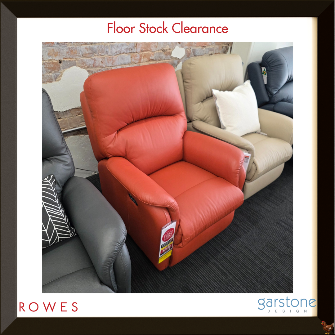 Red recliner chair in a showroom setting with 'Floor Stock Clearance' text and 'Rowes' branding.