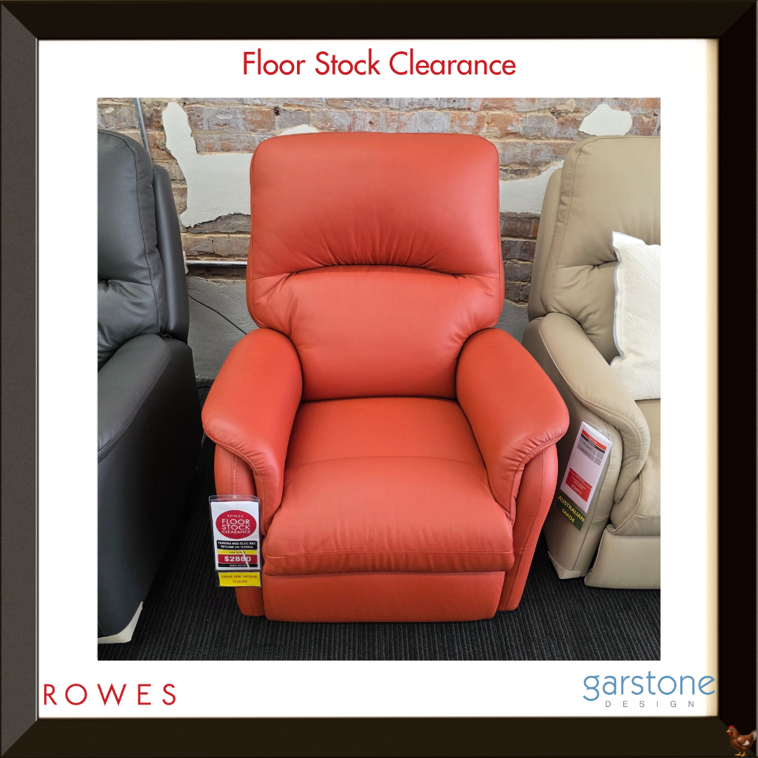 Red recliner chair with clearance tags in a showroom setting, featuring Rowes and Garstone Design branding.