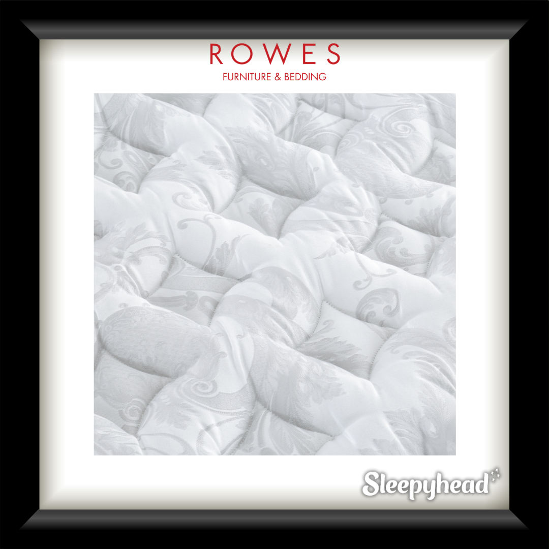 Close-up of quilted mattress with 'Rowes Furniture & Bedding' and 'Sleepyhead' branding.