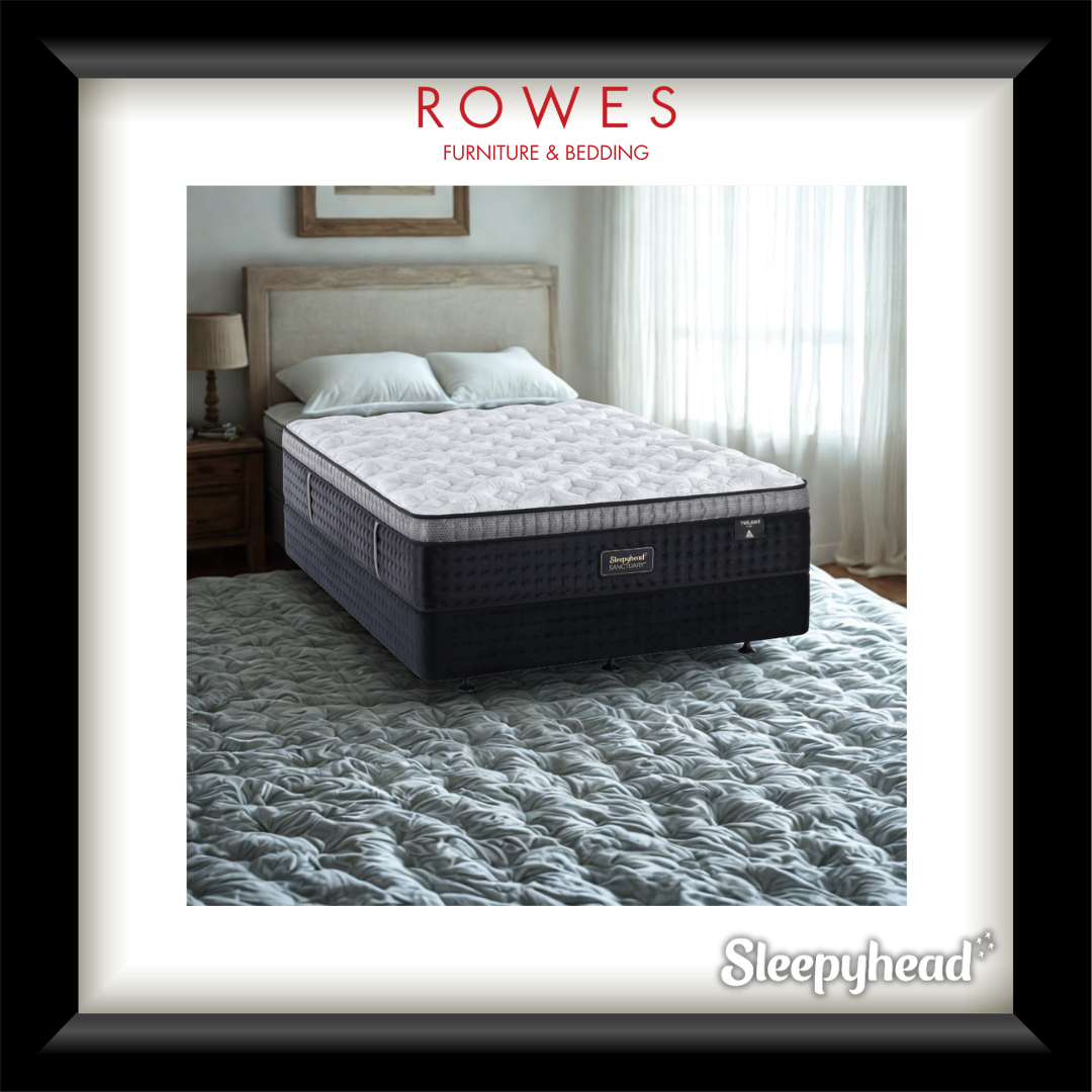 Mattress on a bed with 'Rowes Furniture & Bedding' and 'Sleepyhead' branding.