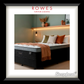 Bed with pillows and a blanket in a bedroom setting, featuring Rowes Furniture & Bedding branding.