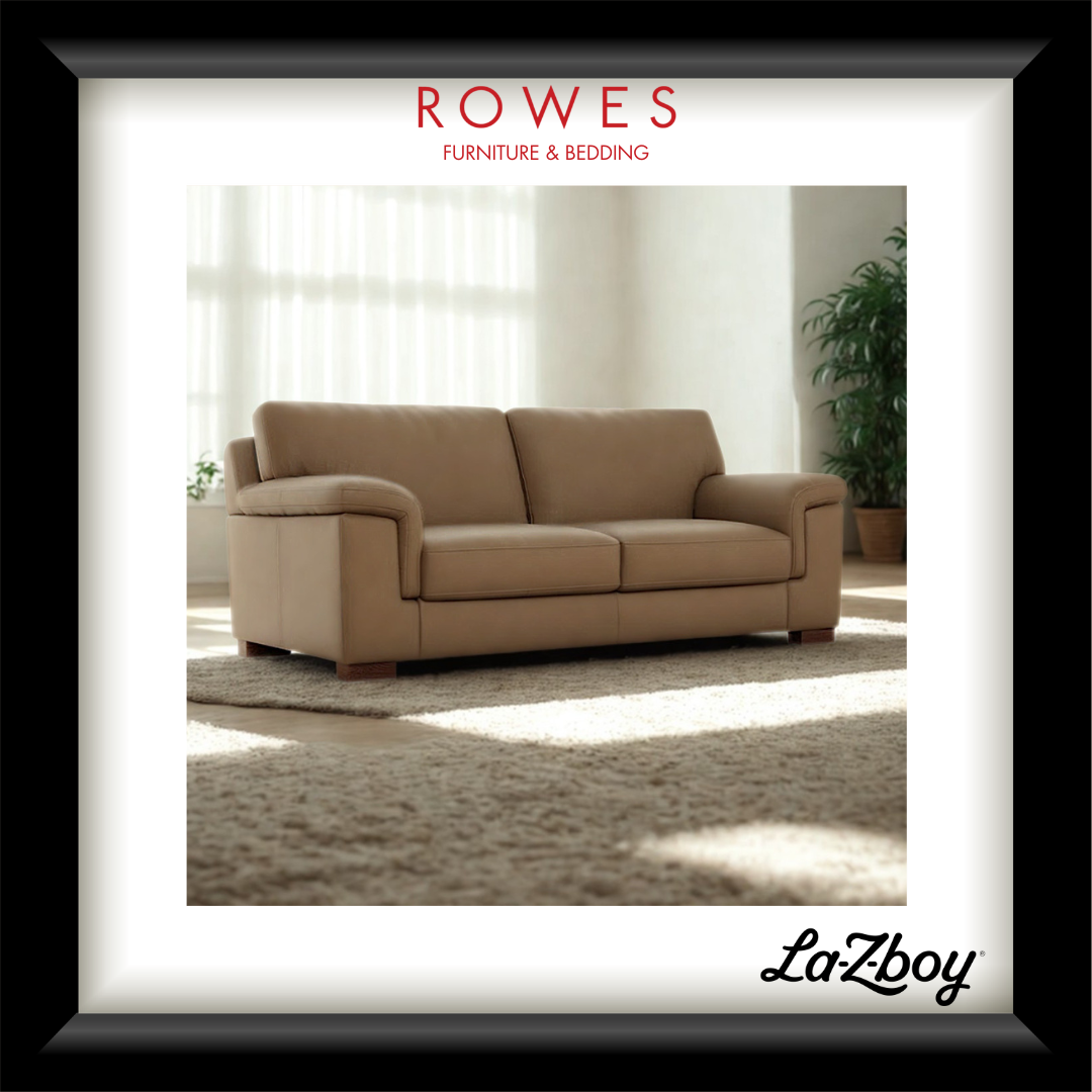 Beige Leather Sofa in a well lit room