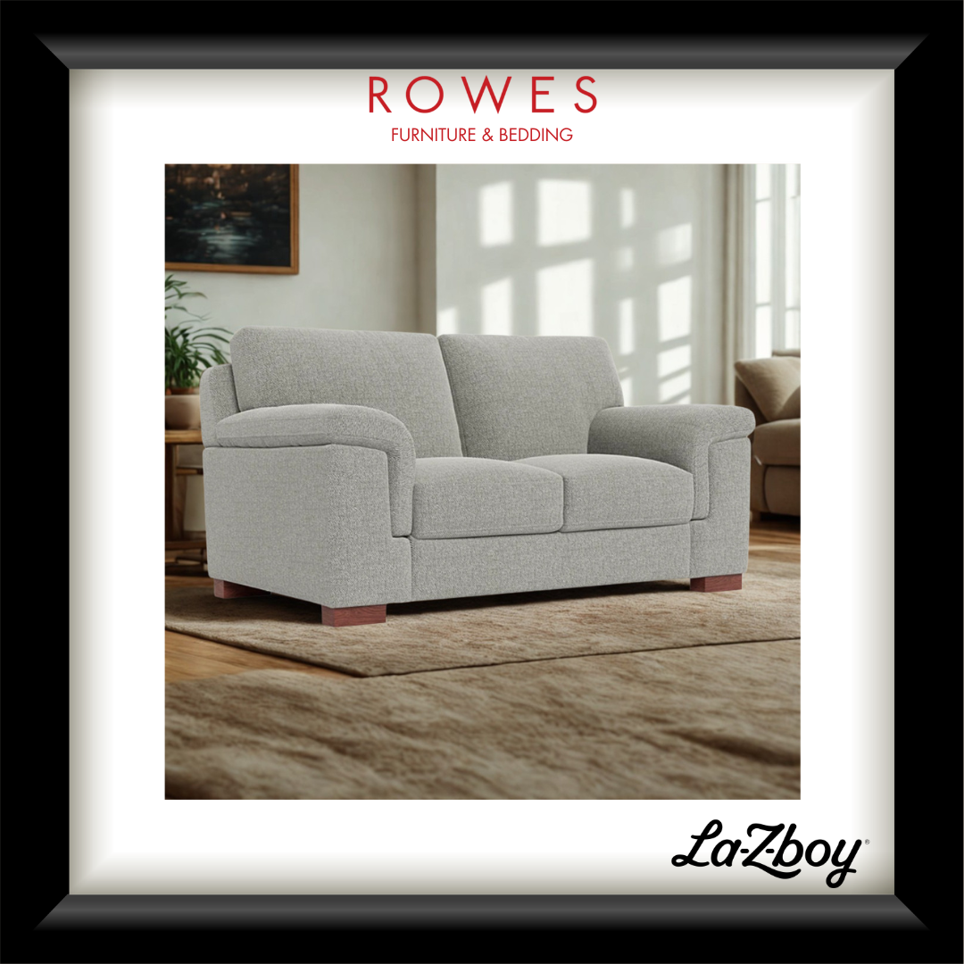 Fabric LaZboy sofa in a well lit room