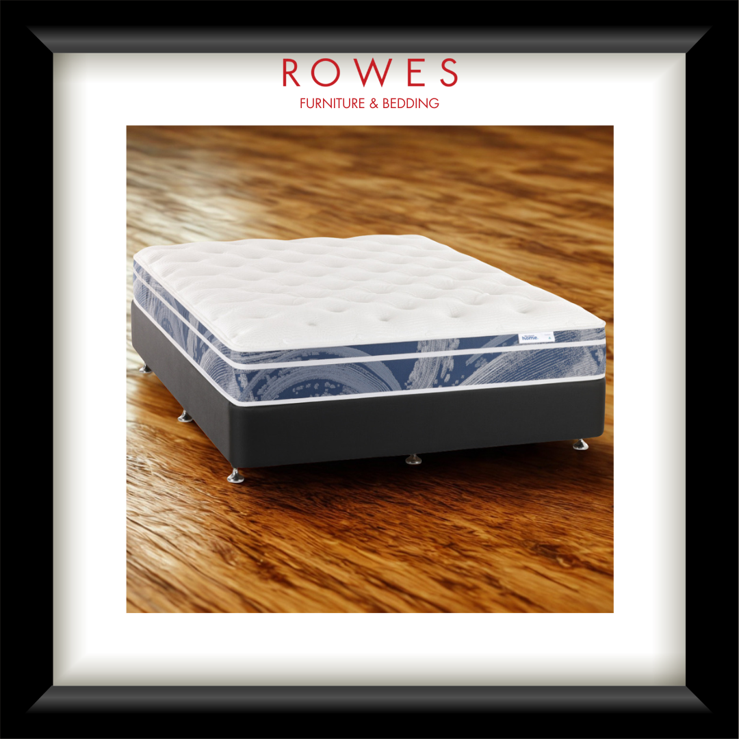 Mattress on a wooden floor with 'Rowes Furniture & Bedding' branding.