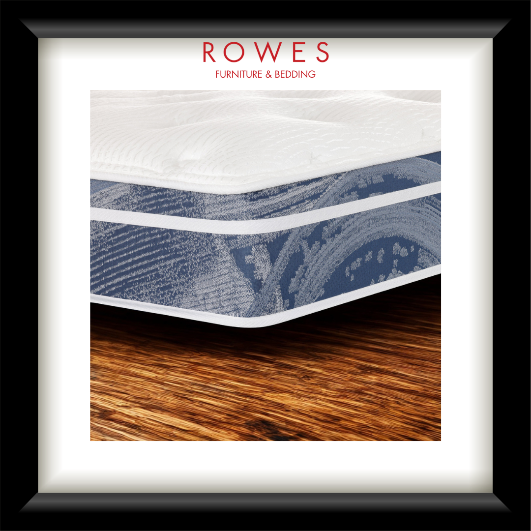 Mattress with visible brand 'Rowes' on a wooden floor.