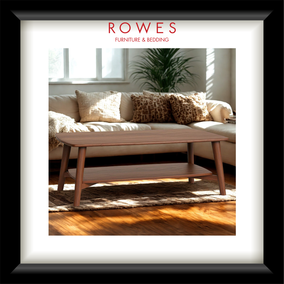 Wooden coffee table in front of a beige sofa with decorative pillows, featuring 'Rowes Furniture & Bedding' branding.